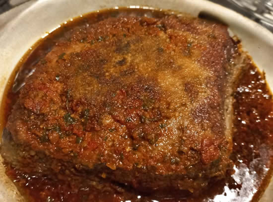 Bife de chorizo en croute de tomates